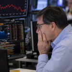 FTSE 100 edges higher as investors balance financial recovery and AI risks